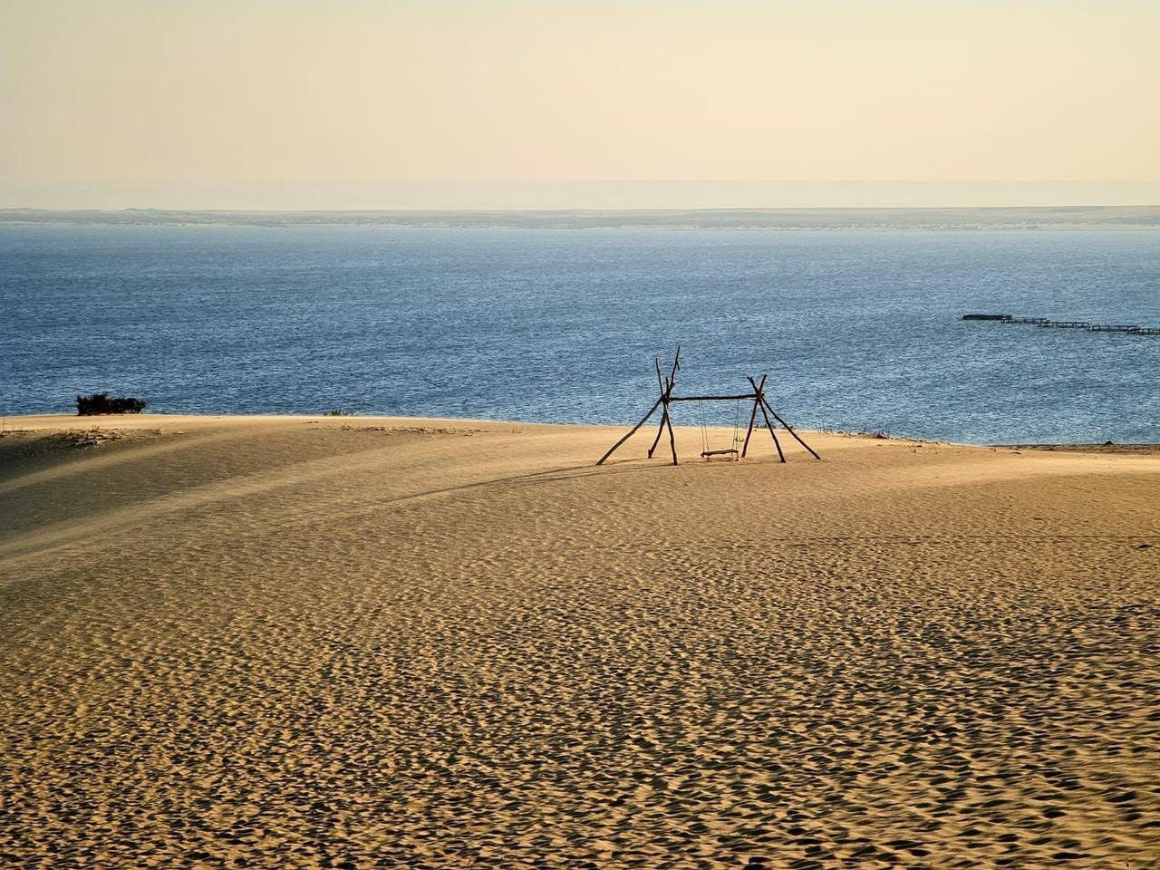 Sand dunes running down to the lake