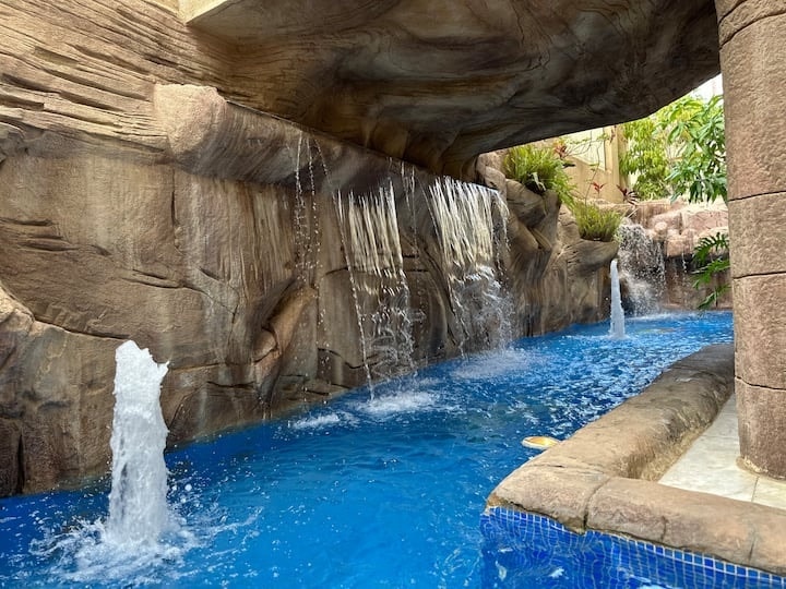 A waterfall feeding the second heated pool