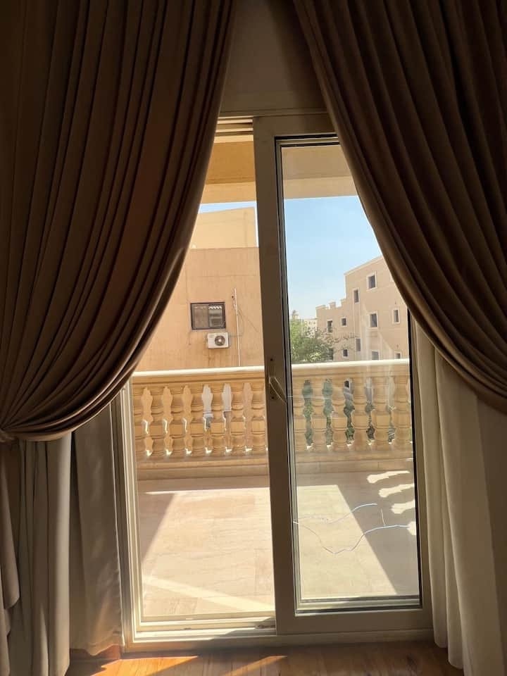 A balcony door in Unit 4