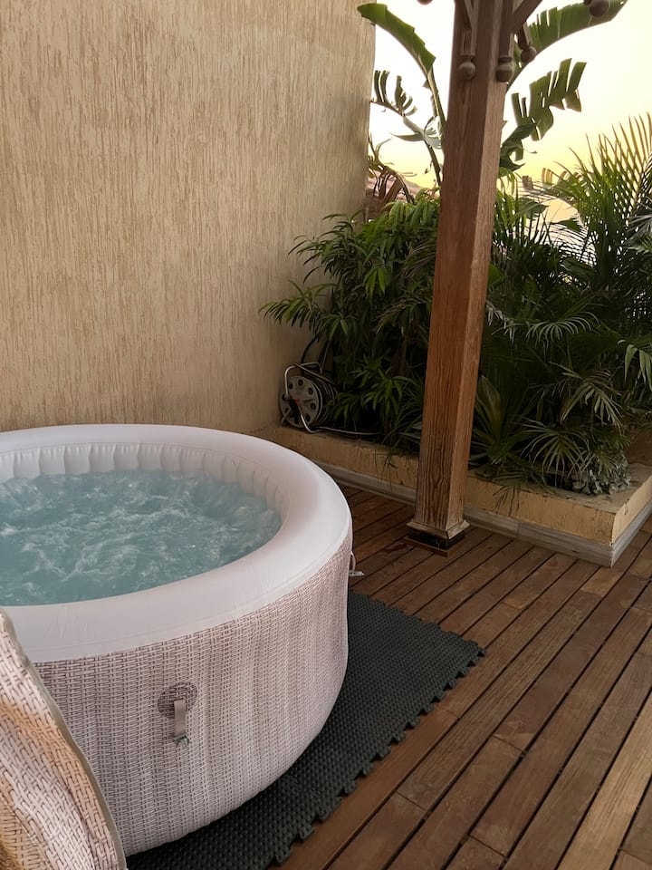 The outdoor heated jacuzzi on the Unit 7 terrace