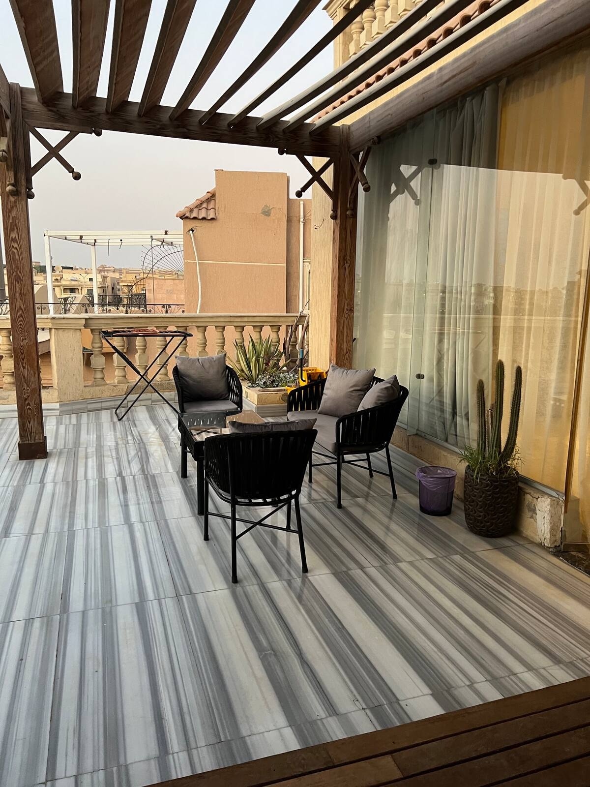 The shaded private terrace of Unit 7
